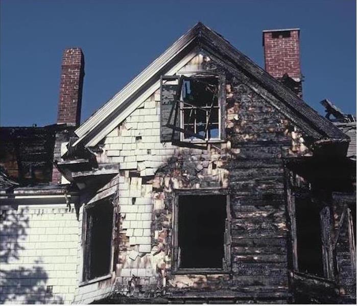 burned out house, 2 story white